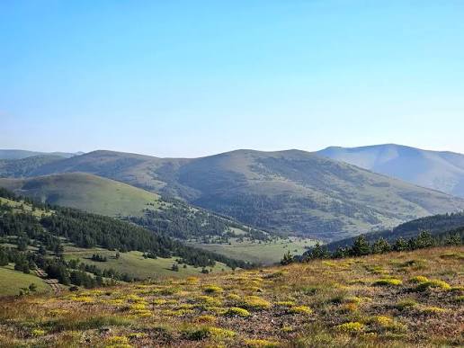 Rolling green hills on the Kukaj hiking trail near Prishtina
